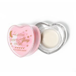 Pink heart-shaped lip sleeping mask with the lid off on a white background