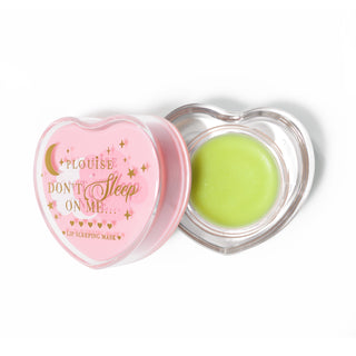 Pink heart-shaped lip sleeping mask with the lid off on a white background