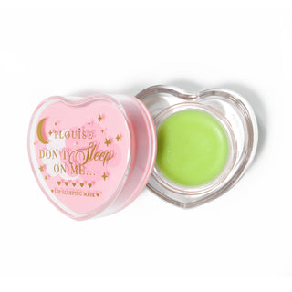 Pink heart-shaped lip sleeping mask with the lid off on a white background